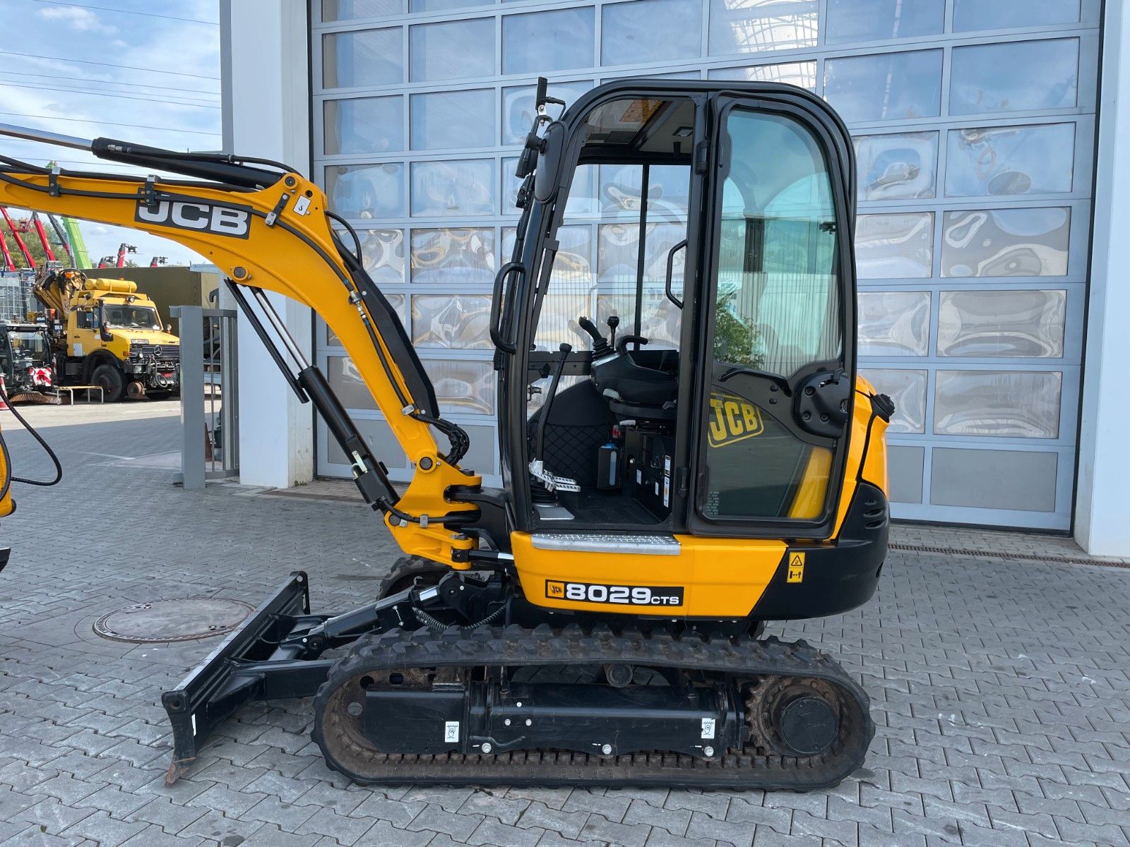 Fahrzeugabbildung JCB 8029 CT / 151h / 2023 / Inkl. Löffelpaket - mit KI generiert/bearbeitet