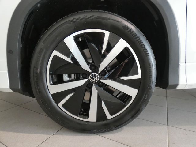 Tayron 1.5 eTSI OPF DSG Elegance AHK 7 SITZER
