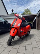 Vespa GTS 125 Super Sport Orange Impulsivo 1. Hand