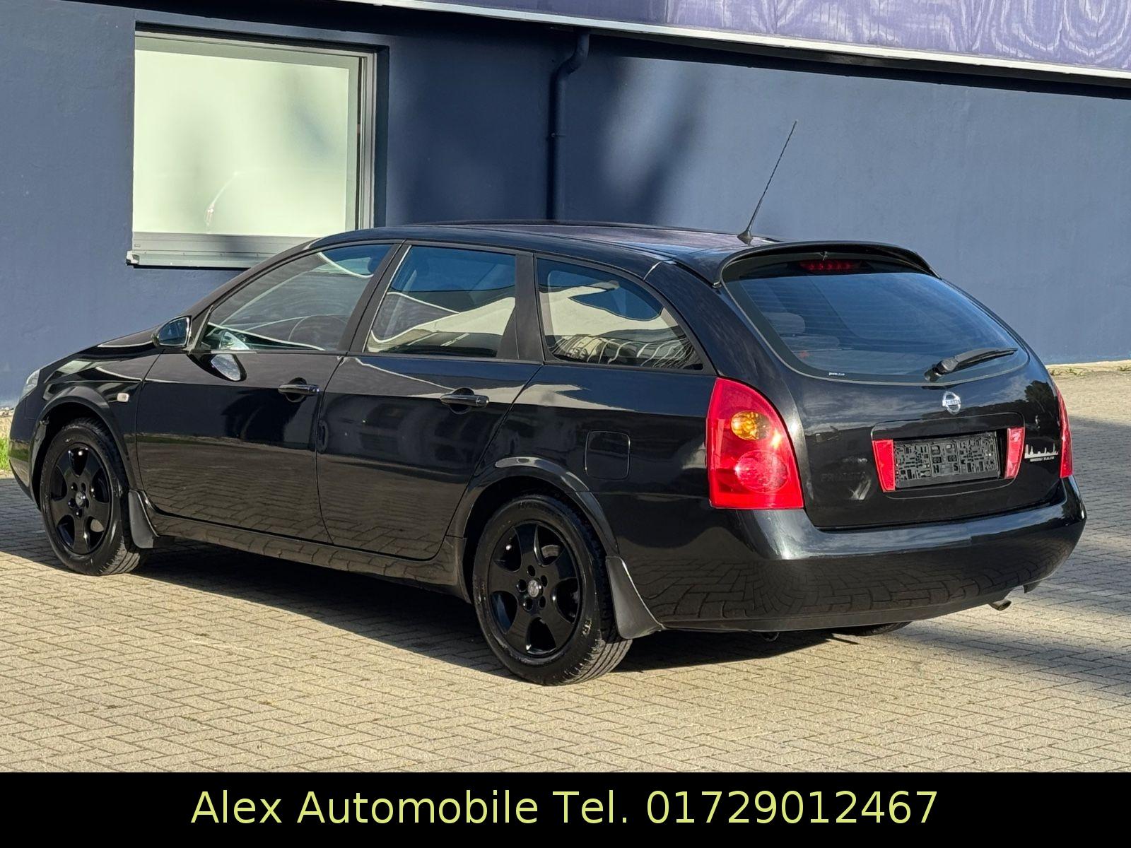 Nissan Primera 2005 — photo 17