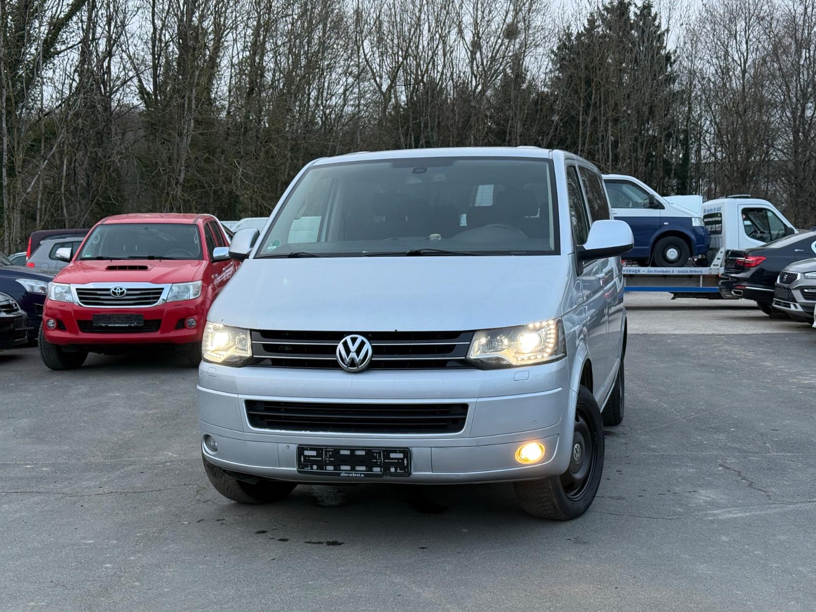 Volkswagen T5.Caravelle*DSG*4Motion*NAVI*AHK*8SITZER*ALLRAD