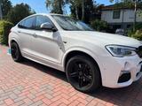 BMW X4 M40i - weiße BMW X4 M40