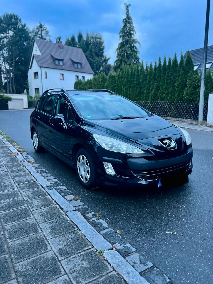 Peugeot 308 2008 — rear view