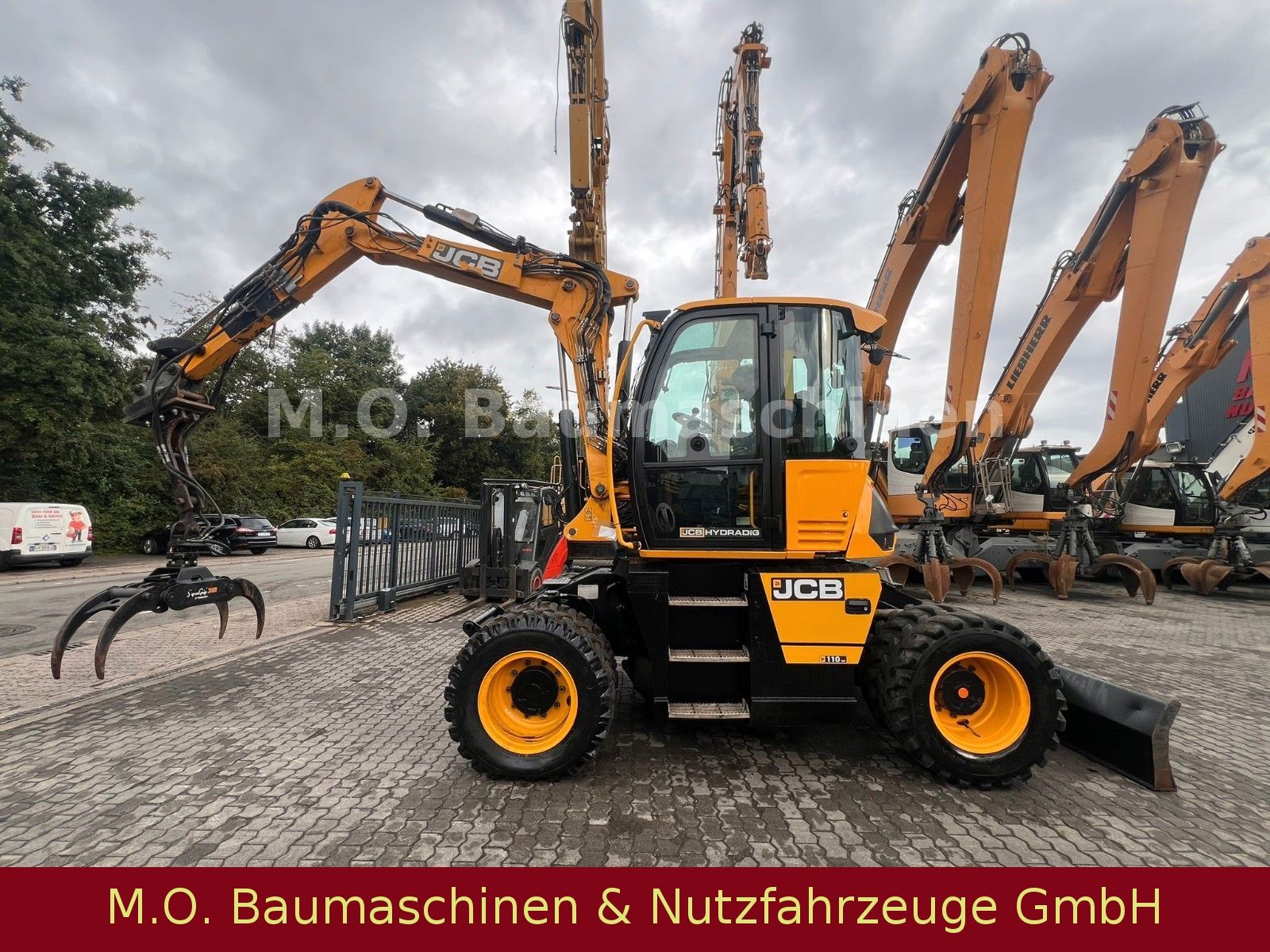 Fahrzeugabbildung JCB 110 W Hydradig / Holzgreifer / 2x Tieflöffel