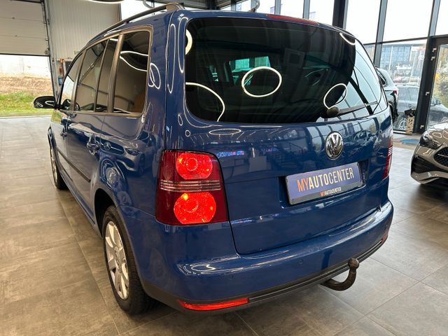 Volkswagen Touran  *7Sitzer*Navi*DSG*Sitzh*BiXenon*