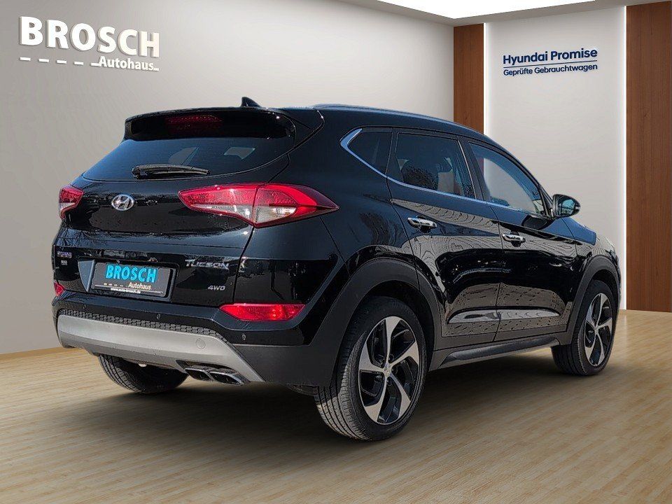 Fahrzeugabbildung Hyundai TUCSON 1.6T 4WD PREMIUM GARANTIE NAVI+KAM+4xSHZ+