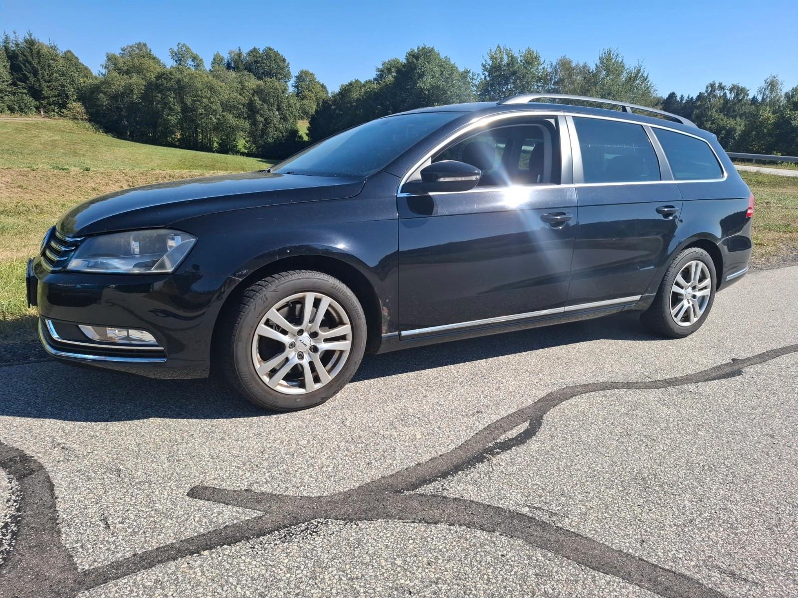 Volkswagen Passat 2013 — вигляд ззаду