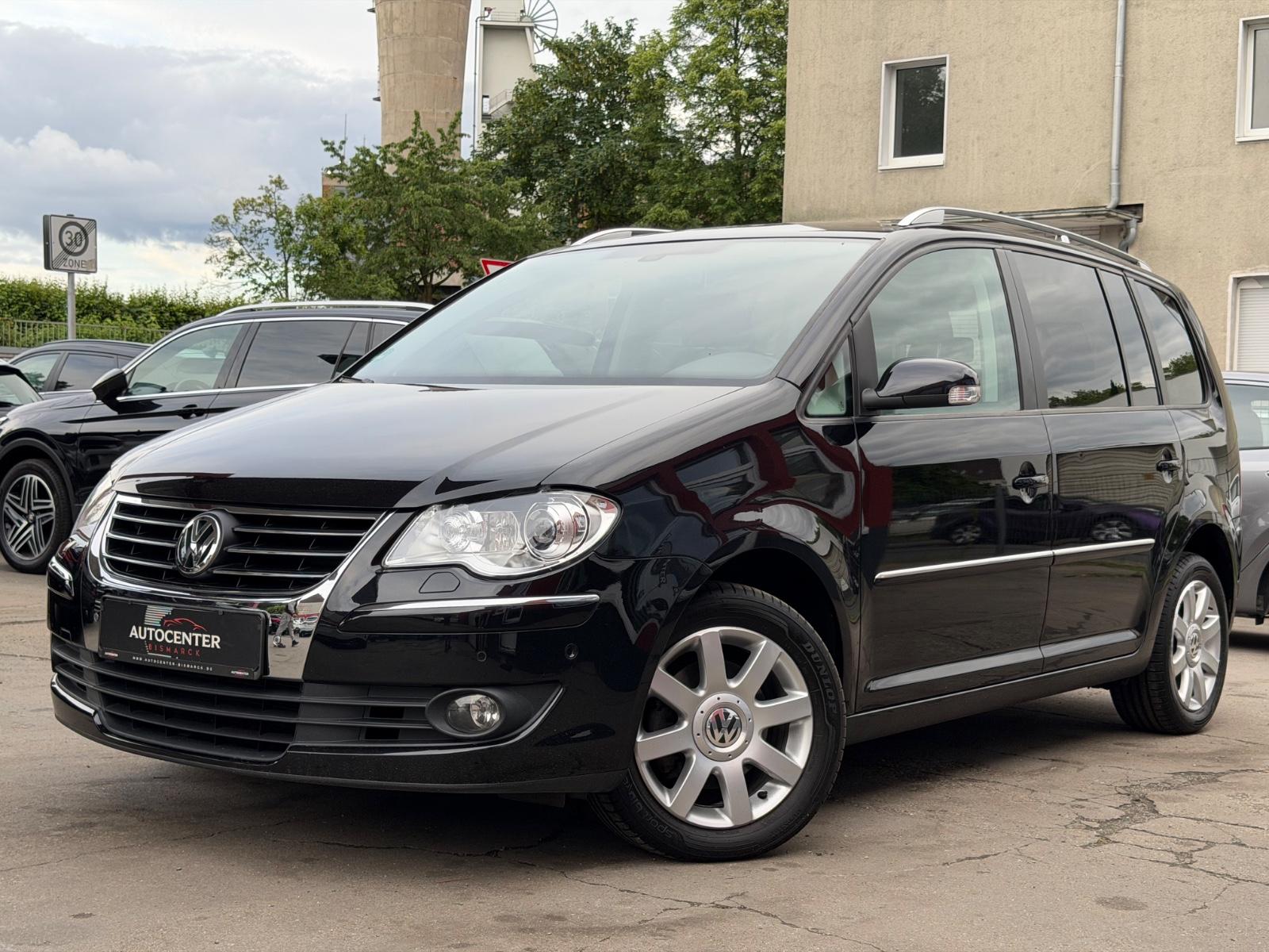 Volkswagen Touran Highline 7-SITZE/BI-XENON/AUS 1.HAND/