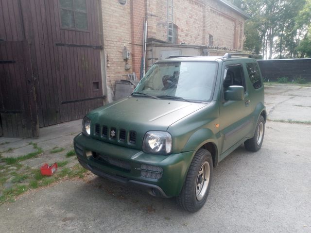 Suzuki Jimny.Automat. Klima.original Farbe Silber.