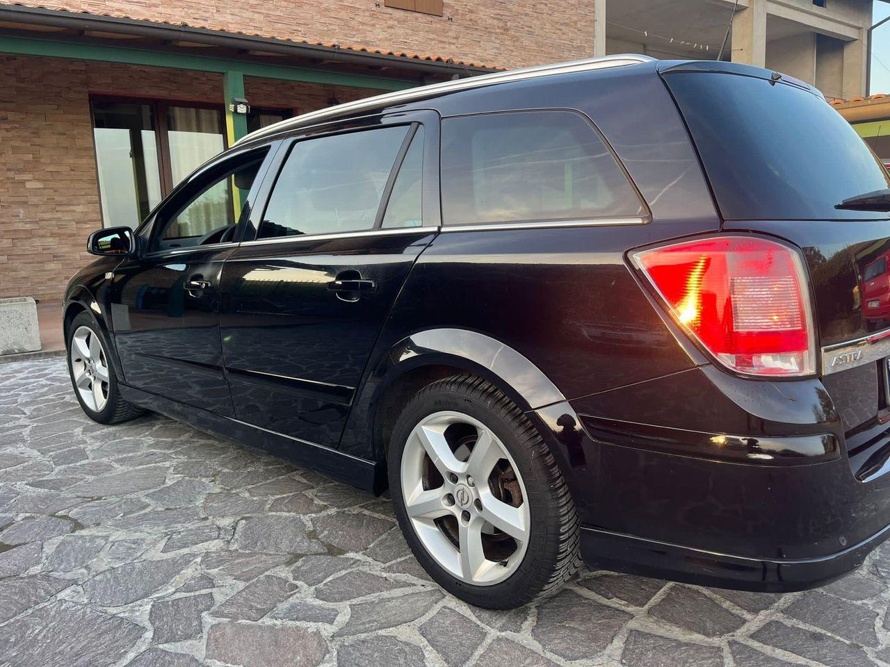 Opel Astra 2009 — engine 1.598 cm³, 116 HP (85kW)