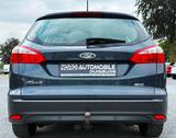 Ford Focus Turnier 1.6 TDCi*SITZH*NAVI*AHK*ZAHNR.-NEU - Ford Focus mit Diesel-Antrieb: Kombi, 1.6
