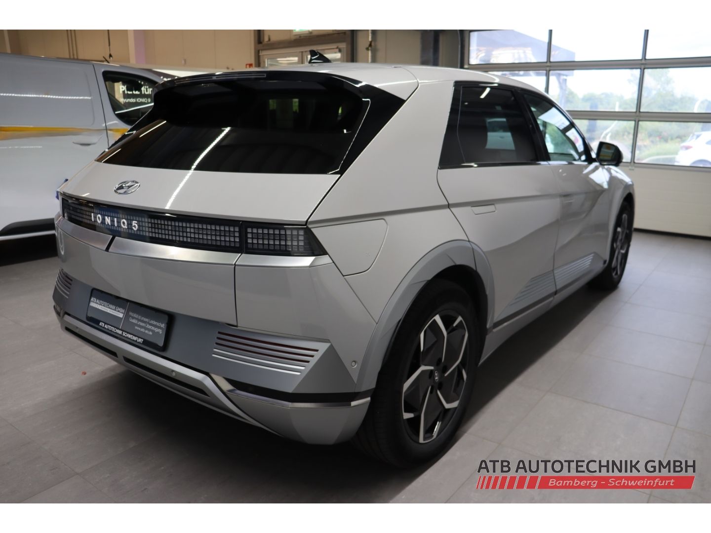 Fahrzeugabbildung Hyundai IONIQ 5 UNIQ 77,4 kWh 2WD 97,7% SOH HUD Navi Sou