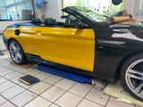 BMW 650i Cabrio - schwarz mit gelber Folie - gebrauchte BMW 650 aus dem Jahr 2015