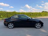 BMW 230i Coupé Sport Line|Automatik|Harman Kardon| - schwarze BMW 230
