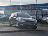 Skoda Octavia Combi Ambiente*TEMPOMAT*PDC*XENON !! - Skoda Octavia aus 2010: Kombi