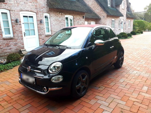 Fiat 500 C in schwarz mit rotem Verdeck zu...