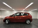 BMW 218i Active Tourer Advantage PDC Navi Shz Klimaa - BMW mit Benzin-Antrieb: Orange