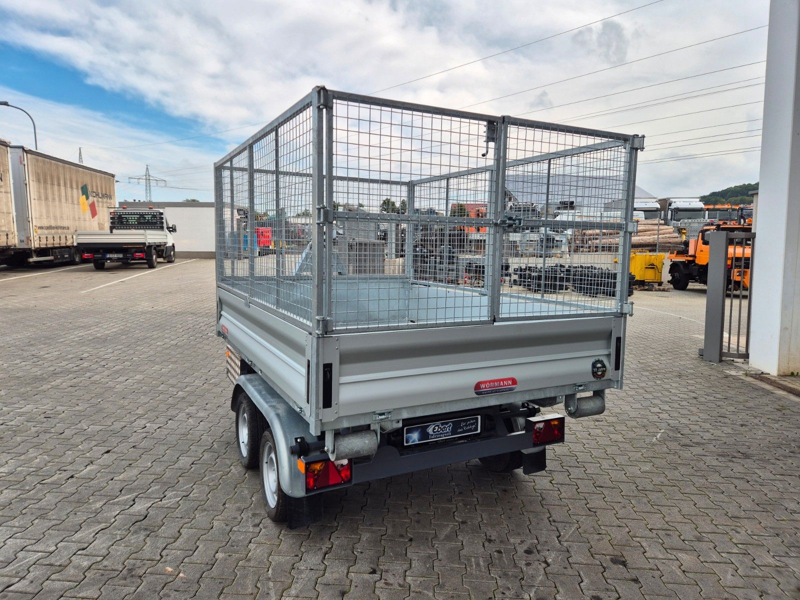 Fahrzeugabbildung Wörmann Abrollkipper Mulde Gitterbox