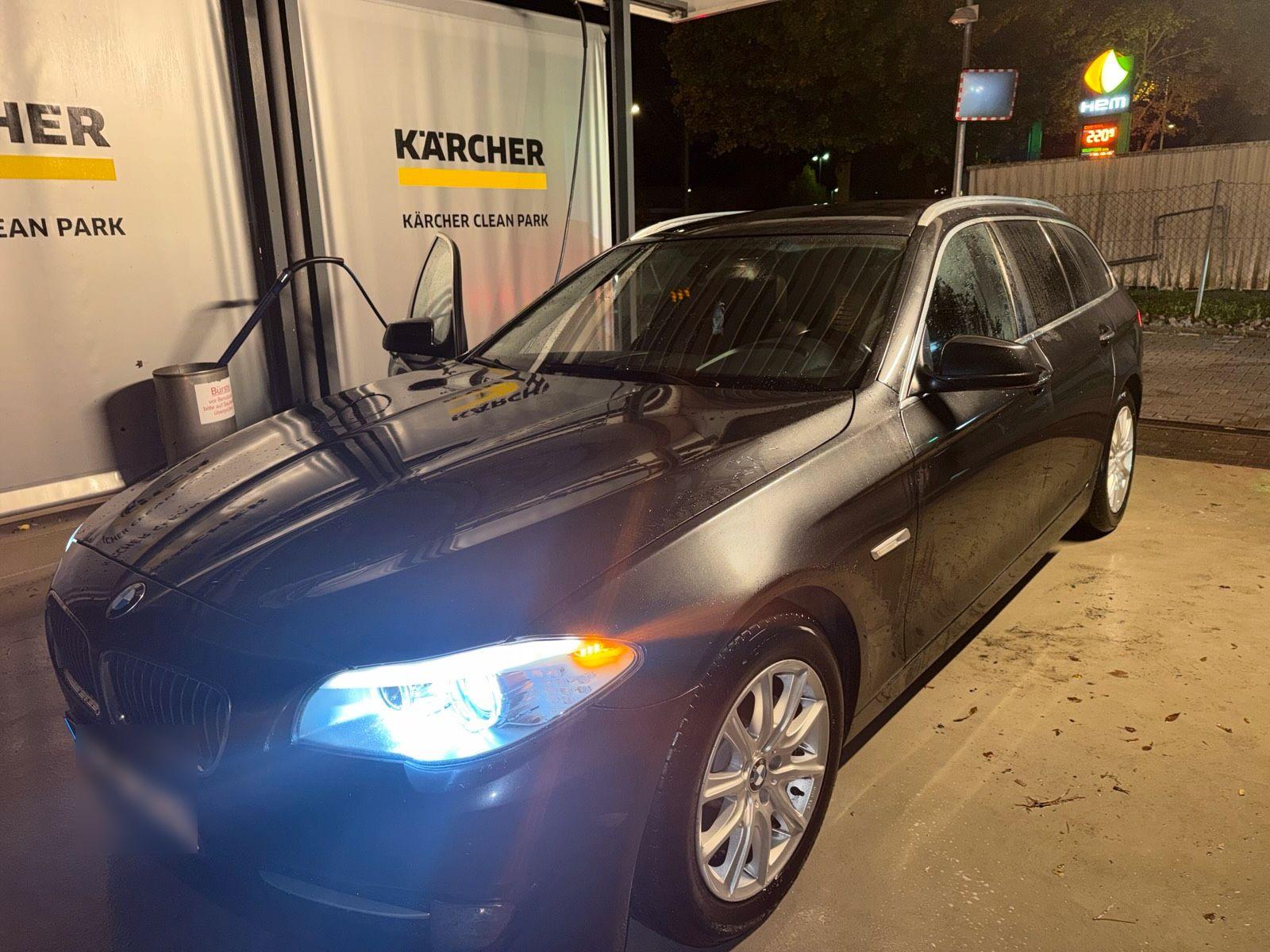 BMW 520 2011 — rear view