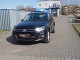 Volkswagen Tiguan 1.4 Navi*Xenon*PDC*AHK*4Motion - VW Tiguan bis 10.000 Euro