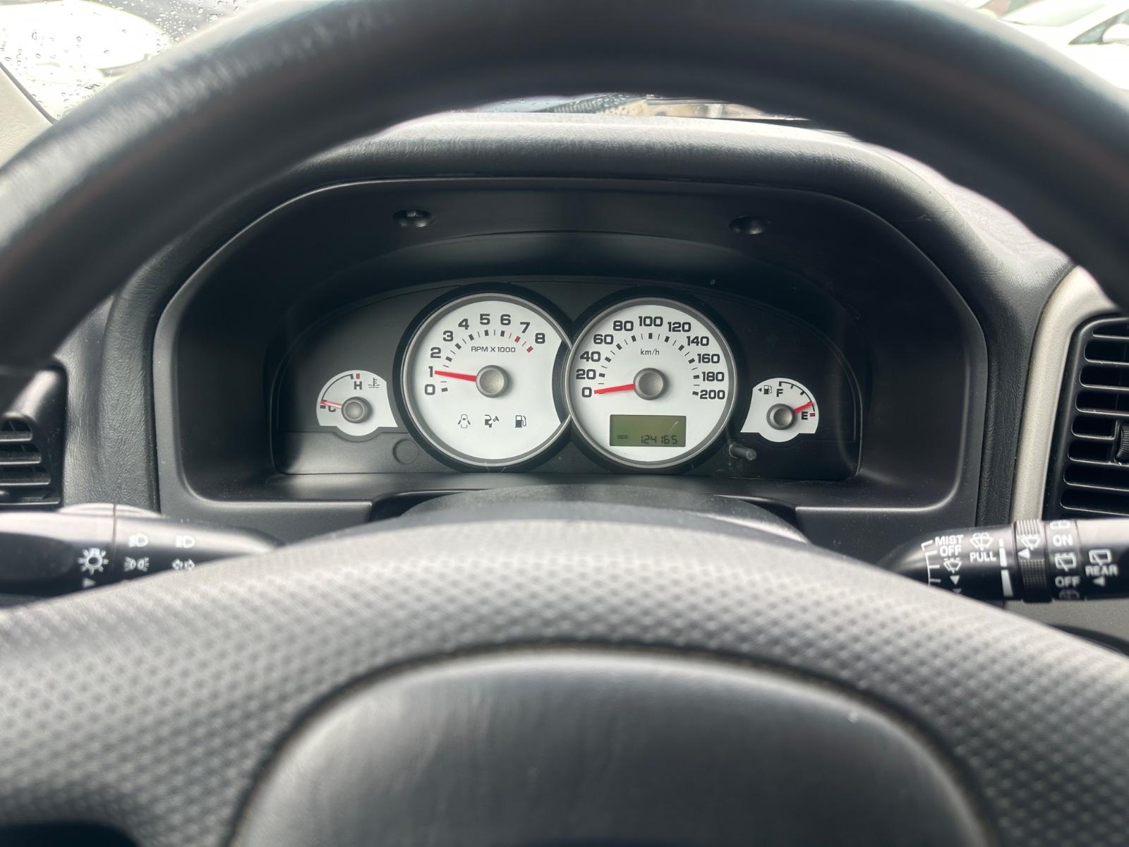 Ford Maverick 2005 — photo 13