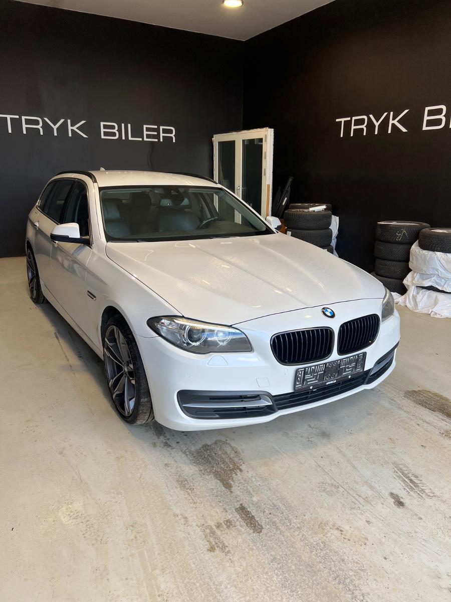 BMW 520 2014 — rear view