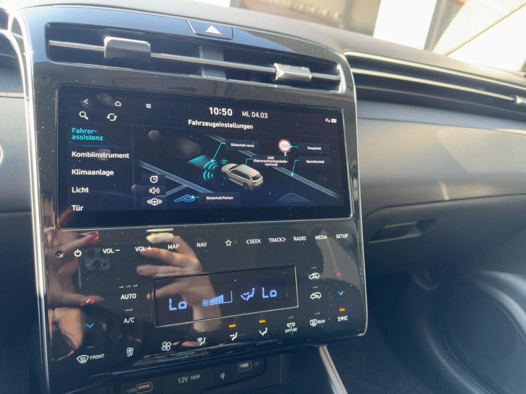 Fahrzeugabbildung Hyundai Tucson AHK  Automatik Hybrid, Allwetterreifen