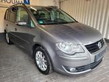 Volkswagen Trendline*SEHR GEPFLEGT*SCHECKHEFT*SITZHEIZUNG* - gebrauchte VW Touran aus dem Jahr 2009