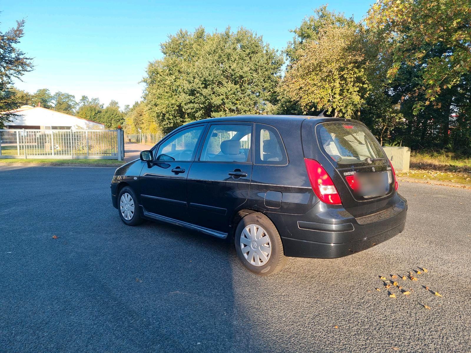 Suzuki Liana 2005 — вигляд ззаду