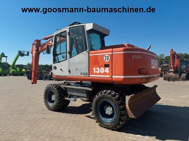 Atlas 1304  mit Greifer