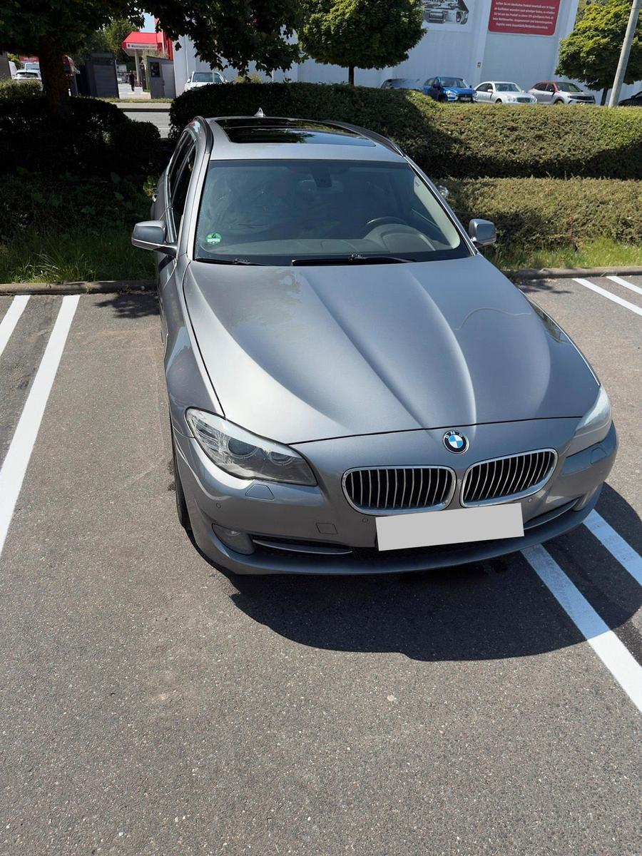 BMW 520 2013 — rear view