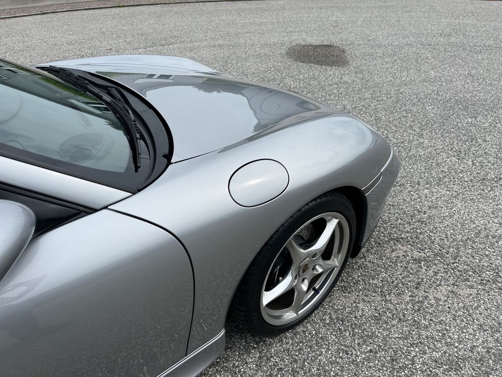 PORSCHE 911 996 Carrera Coupé Jubiläumsmodell Deutsch PORSCHE 911 996 Carrera Coupé Jubiläumsmodell Deutsch