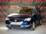 Volkswagen Touran United #Navi #7-Sitze #SHZ #Tempomat - gebrauchte VW Touran aus dem Jahr 2009