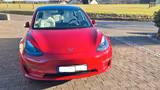 Tesla Model 3 Allradantrieb mit Dualmotor Long Ran... - rote Tesla Model 3