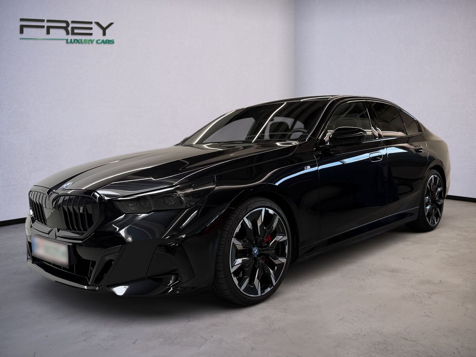 BMW i5 eDrive40 M | Black Sapphire | B&W
