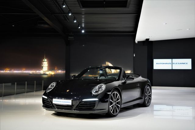 Porsche 991 Cabrio*SPORTABGAS*20"LM*PCM*SOUND-PACK.*1-HD