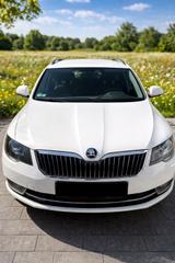 Skoda Superb 1.8 TSI Exclusive Combi Exclusive - Skoda Superb aus 2014 mit Benzin-Antrieb: Kombi