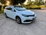 Toyota Auris TS Automatik | CarPlay | TÜV 09/27 - weiße Toyota Auris Touring Sports
