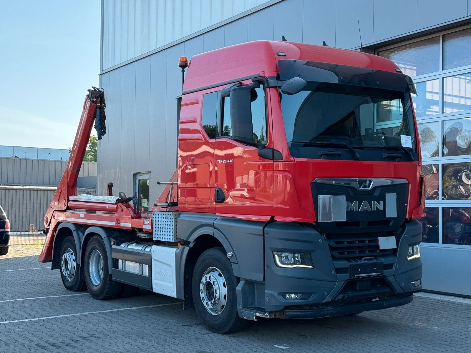 Fahrzeugabbildung MAN TGX 26.470 6x2-4 BL VDL P-18 Absetzkipper Funk.