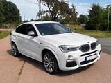 BMW X4 M40 M40i - - weiße BMW X4 M40