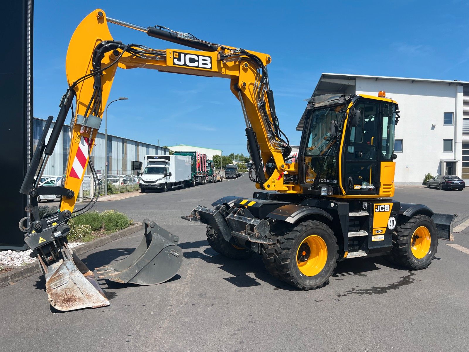 Fahrzeugabbildung JCB Hydradig 110W / Pratzen / nur 179h / Löffelpaket