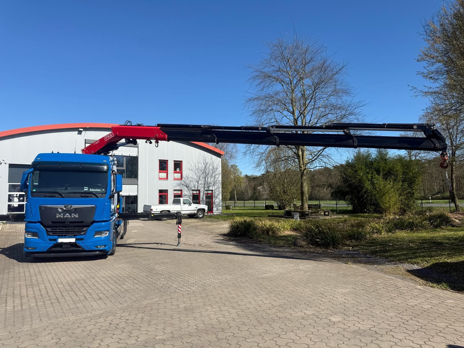 Fahrzeugabbildung MAN TGX 26.640 mit Fassi F365A2.26 Containerpritsche