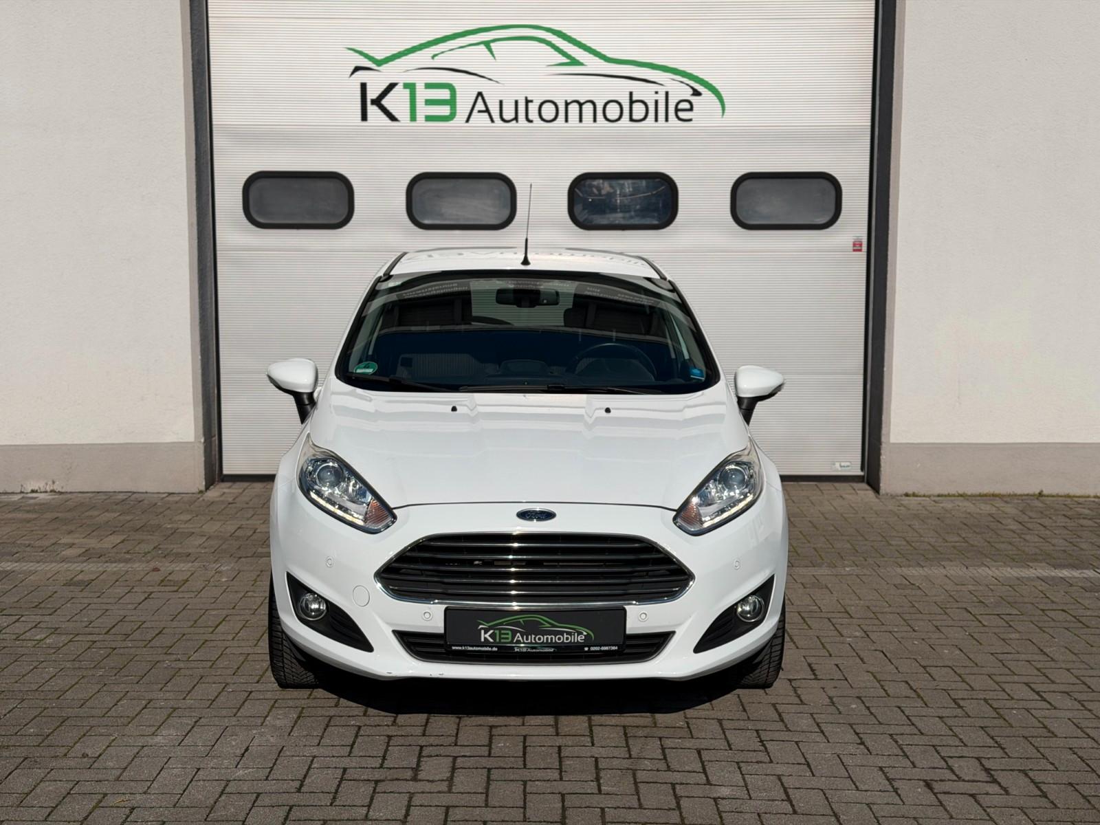 Ford Fiesta Titanium*RFK*NAVI*VOLL CHECKHEFT*SZH*MFL*