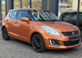 Suzuki Swift Comfort / Sitzheizung /  Tempomat - Suzuki Swift mit Benzin-Antrieb: Orange