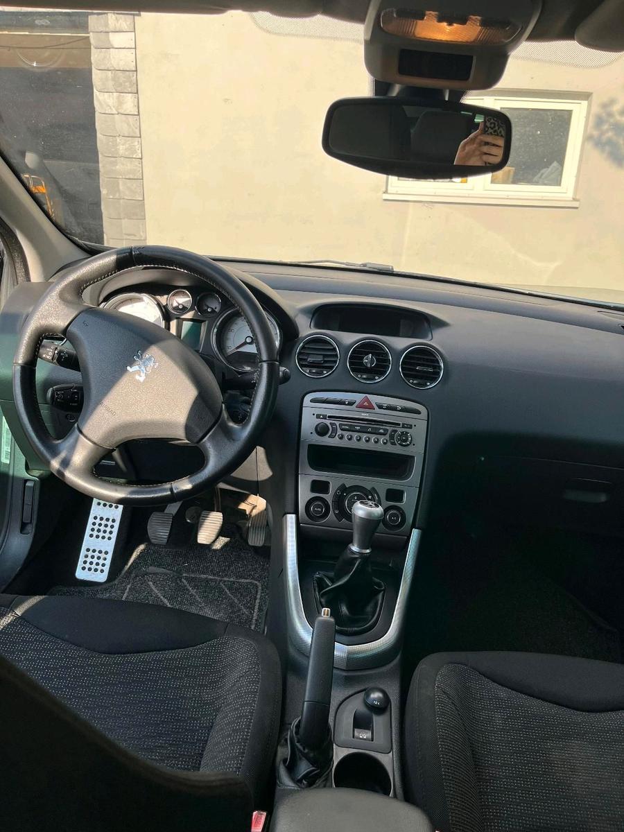 Peugeot 308 2009 — photo 9