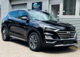 Hyundai Tucson Style 4WD KLIMAAUT NAVI SITZ+LENKRAD HZG. - gebrauchte Hyundai TUCSON aus dem Jahr 2019