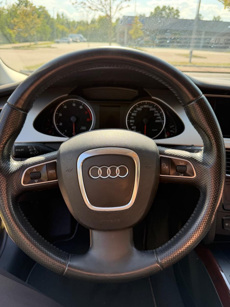 Audi A4 2009 — photo 8