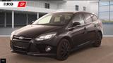 Ford Focus Champions 1.6 NAVI/PDC/SHZ/KLIMA/ALLWETTER - Ford Focus mit Benzin-Antrieb: Kombi, 1.6