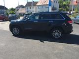 Jeep GRAND CHEROKEE 3.0 CRD NAVI LEDER KAMERA AHK 3.5 - Jeep Grand Cherokee aus 2014 mit Diesel-Antrieb: Geländewagen