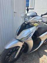 Kymco New People S200i ABS - KYMCO ROLLER 200